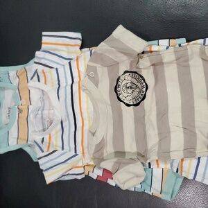 3 used 0-3 months onsies various colors